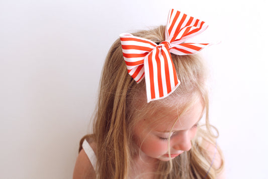 Large red stripe bow