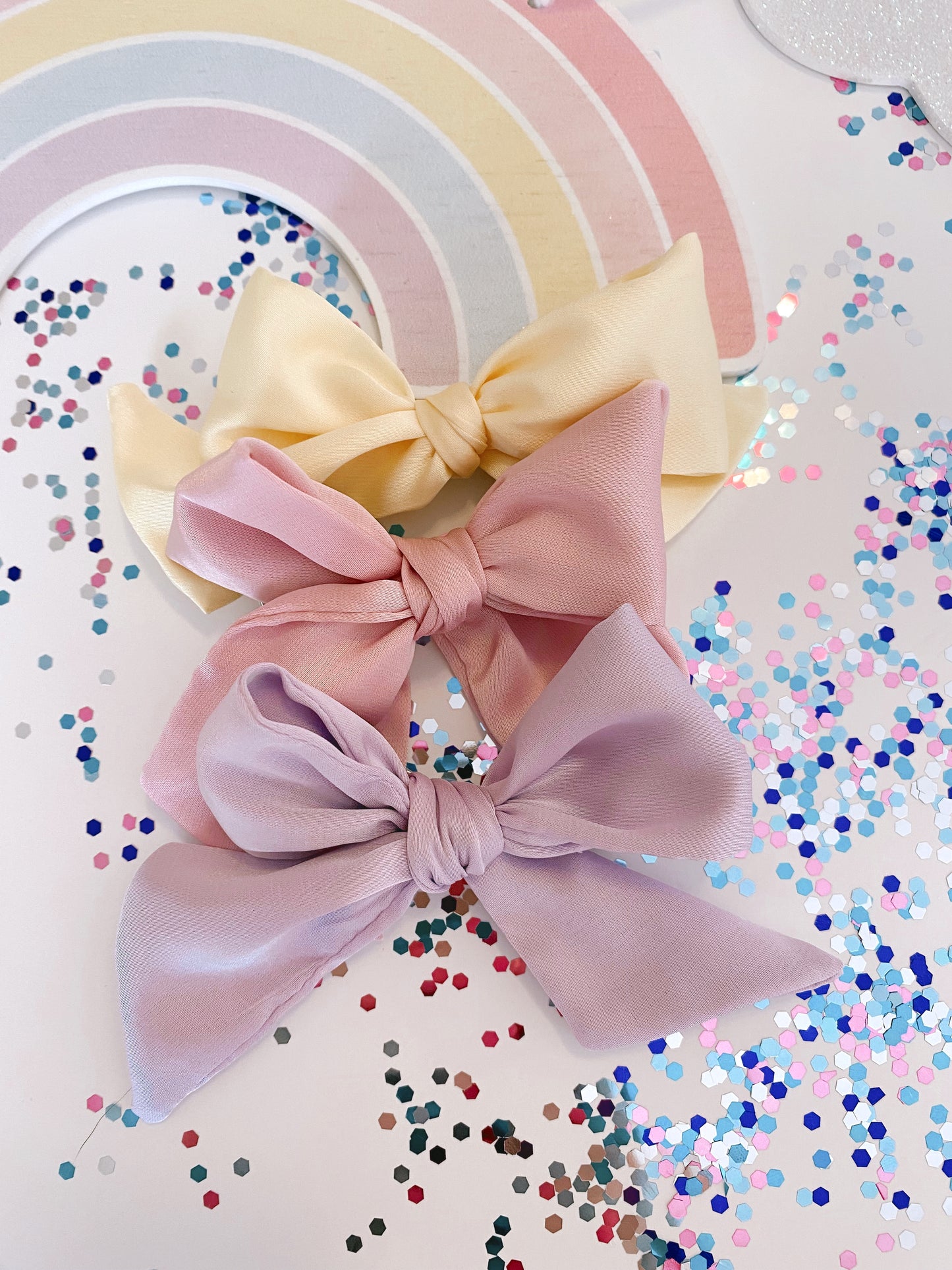 Small rose pink silk bow