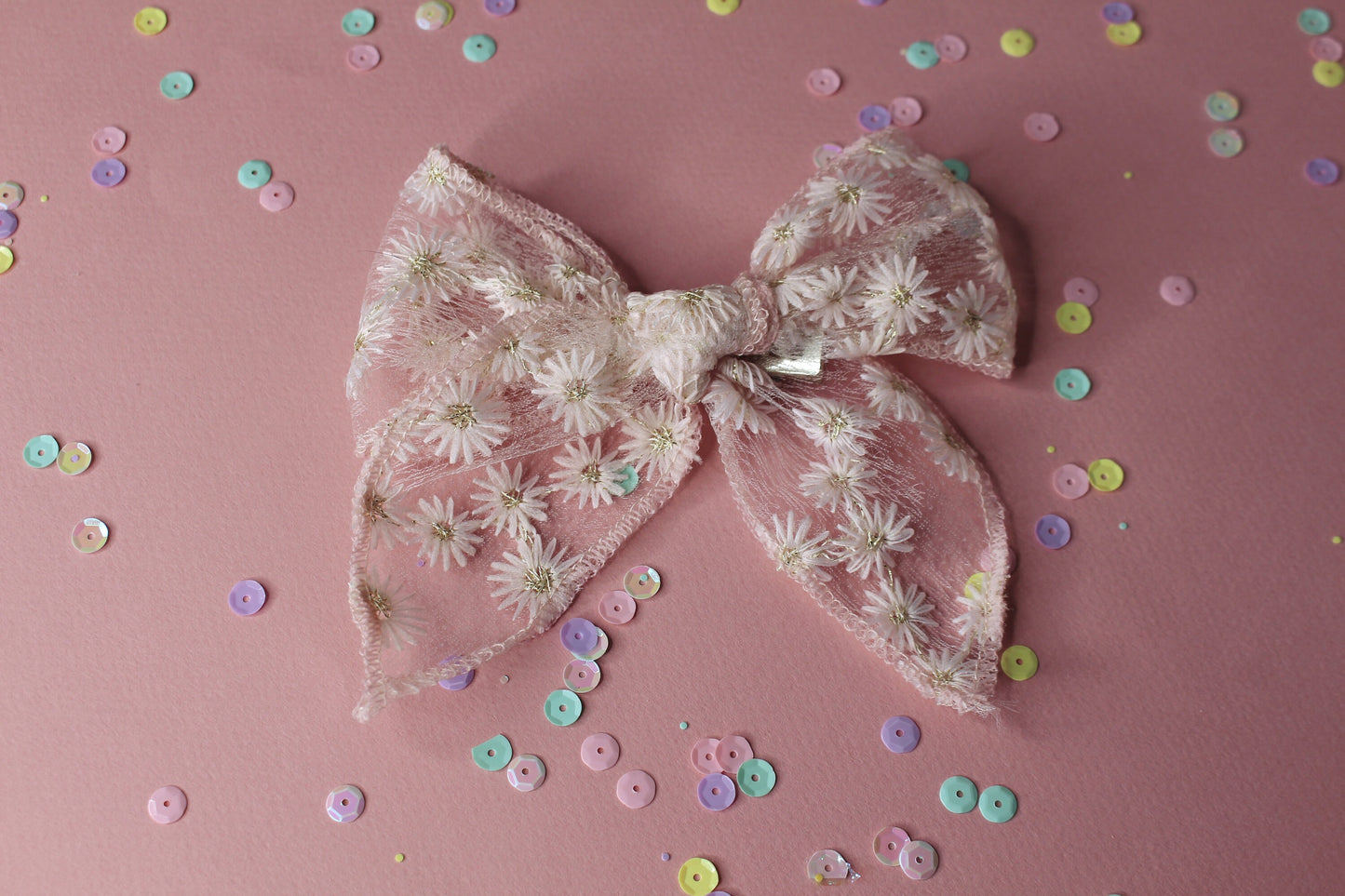 Pink flower embroidered tulle bow