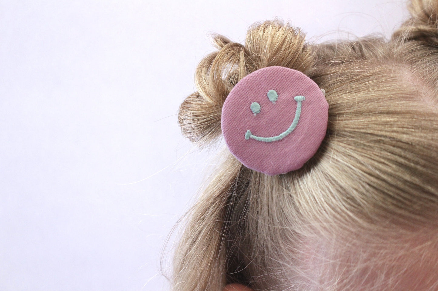 embroidered smiley clips